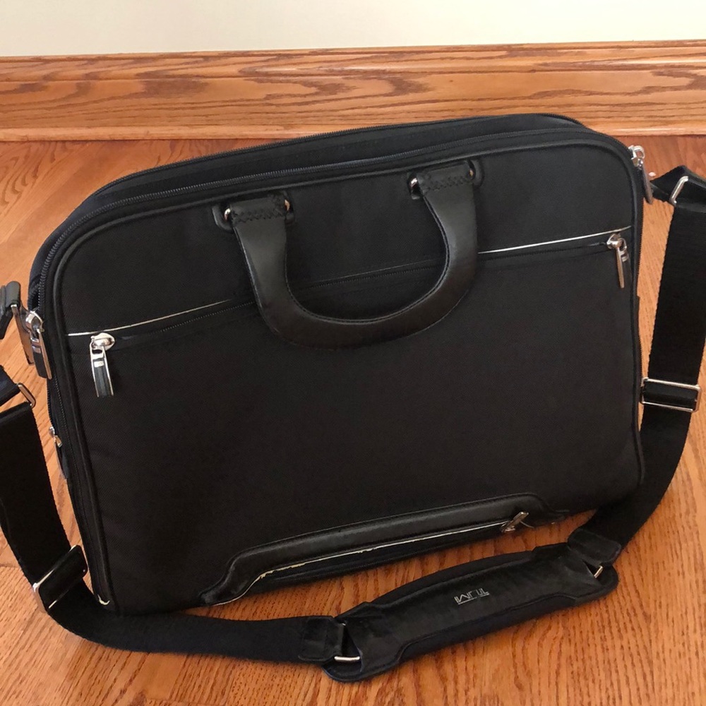 Tumi briefcase (includes laptop holder inside)